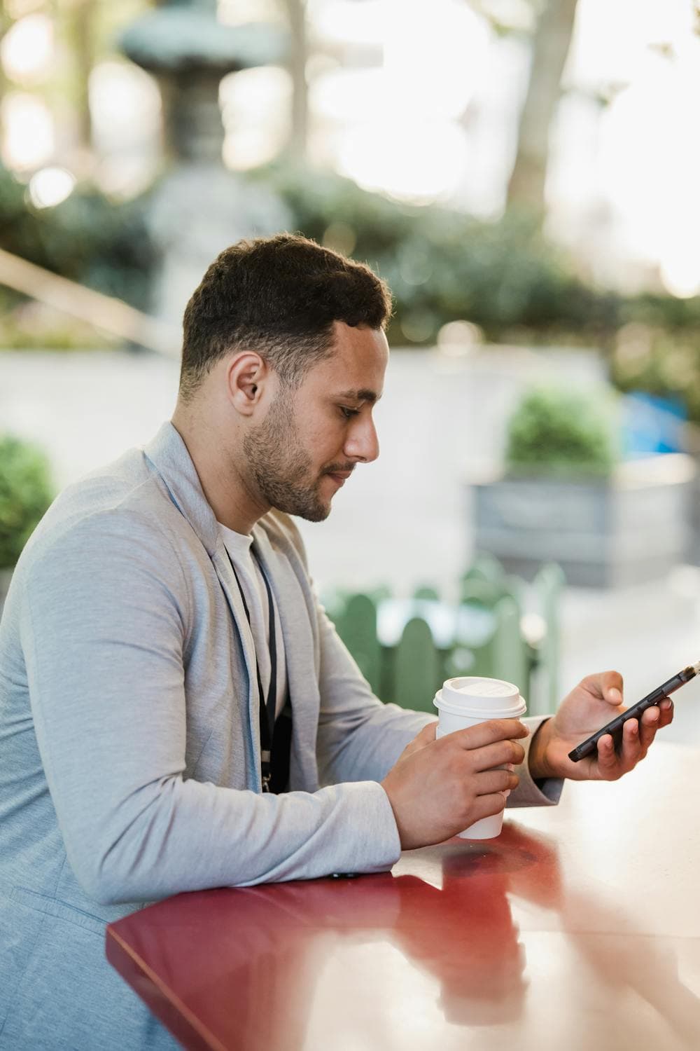 Man using smartphone on lunch break